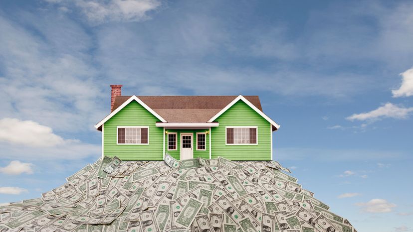 house on pile of cash