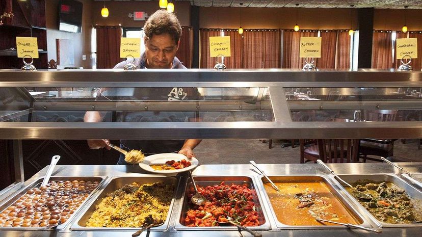 Some all-you-can-eat buffets have begun charging diners whose eyes are bigger than their stomachs. Katherine Frey/The Washington Post/Getty Images