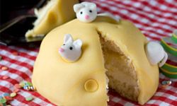 Minus the marzipan mice, this cake would be a boring, yellow dome.
