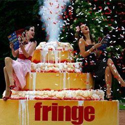 Confetti erupts from a giant cake at the 2007 Edinburgh Fringe Festival.