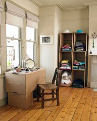 No closets? No problem. Cardboard offers a variety of storage solutions.