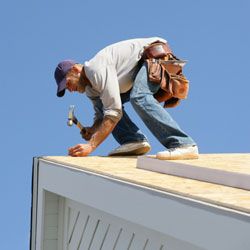 Until a professional can repair your roof, cardboard can keep leaks at bay.