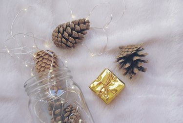 Christmas pine cones with glass jar