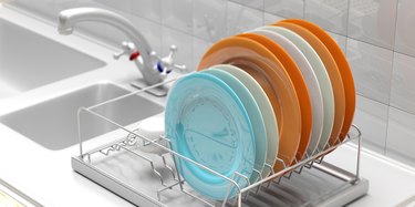 dish-drying rack with colorful plates
