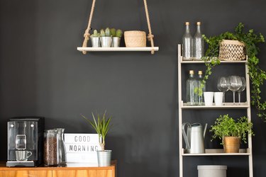 Hanging shelf and bookcase with decor