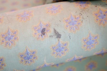 Ink pen stain on a fabric couch