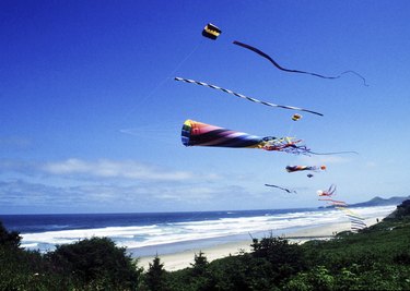 Kites flying on a beach