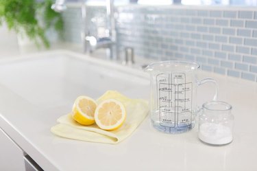Clean a smelly drain with natural products such as lemon and baking soda.