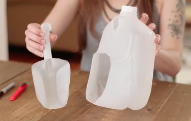 Make a scoop out of a milk jug