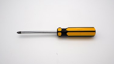 Close-Up Of Screwdriver On White Background