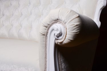 Handle and textile on elegant white sofa