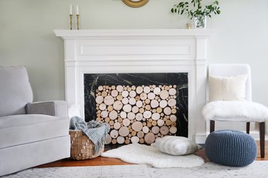 Faux stacked log fireplace cover