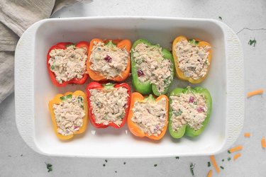 Scoop tuna into the bell peppers