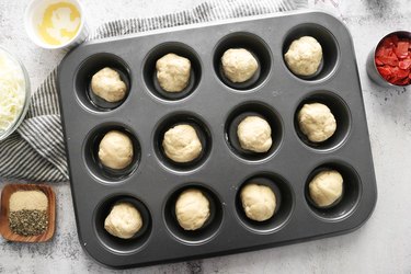 Form pizza dough into balls