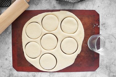 Roll dough and cut out circles