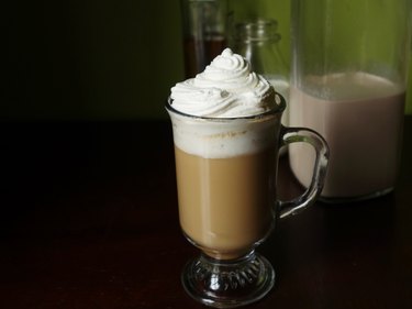 Mug of Irish Coffee with homemade low-carb sugar-free irish cream liqueur.