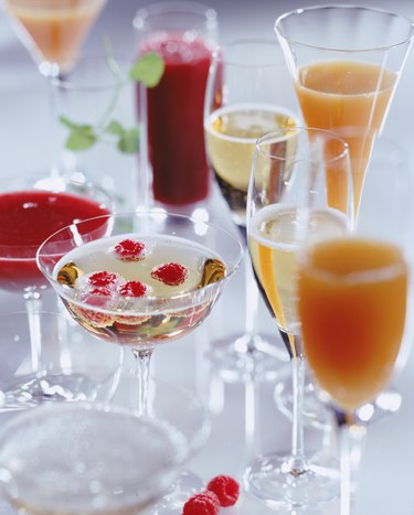 Juice with cocktail in glasses, close-up