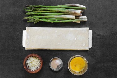 Ingredients for garlic Parmesan asparagus twists