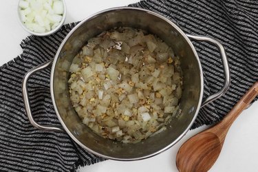 Cook onion, garlic and ginger