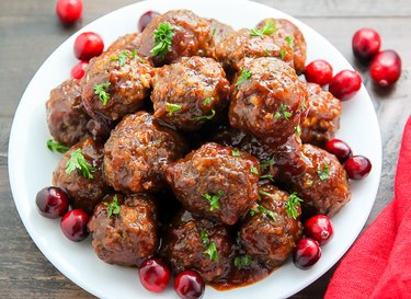 Moist meatballs covered in cranberry barbecue sauce.