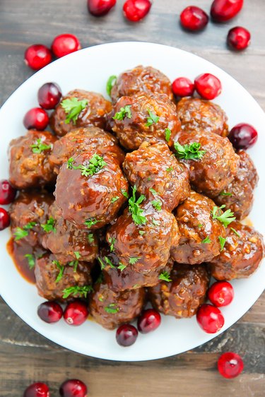 Moist meatballs covered in cranberry barbecue sauce.