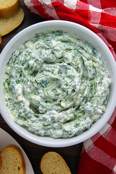 Spinach dip with baguette.