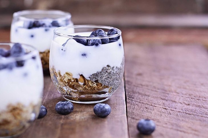 Kefir yogurt and chia parfaits. Kefir is one of the top health foods available providing powerful probiotics. Extreme shallow depth of field.