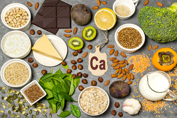 26 Calcium Rich Foods For Bone Health | Whether you're looking for calcium rich foods for women or for men who follow a vegan diet, for toddlers who are picky eaters, and/or for kids who follow a dairy free diet due to foods sensitivities or allergies, this post is for you! We're sharing some background information on hypocalcemia / calcium deficiency, including signs, symptoms, causes, risk factors, and the role of vitamin D, plus a list of foods that are delicious and high in calcium!