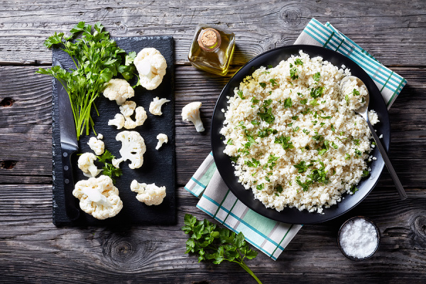 60 Cauliflower Rice Recipes | If you want to know how to make cauliflower rice, this post has all the basics, along with some of the best healthy, easy to make recipes you'll wish you tried sooner! From simple cheesy recipes, to low carb keto cauliflower rice, to spicy Mexican ideas, to flavorful Asian fried cauliflower rice, to vegan recipes chock full of plant-based protein, you can meal prep many of these so you have a healthy and filling meal on even your busiest days!